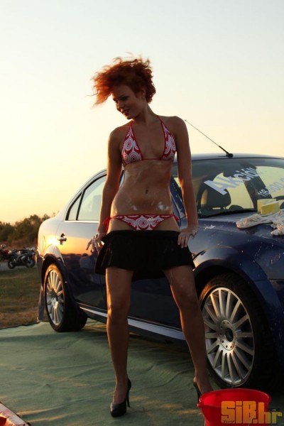 Sexy Girls Washing a Car