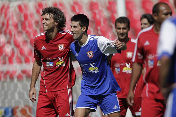 Novak Djokovic scores from the penalty spot in Brazilian celebrity football match