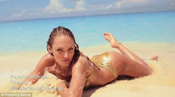 Sexy Candice Swanepoel in golden bikini