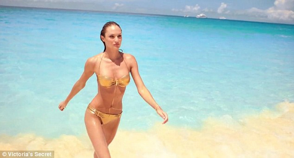 Sexy Candice Swanepoel in golden bikini